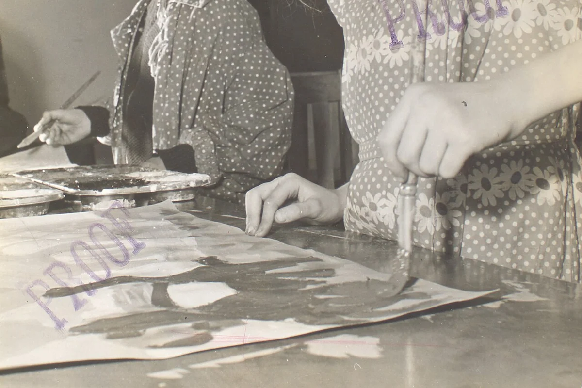 Students working in a community painting class